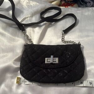 Cute little shimmery black crossbody bag with silver clasp and chain